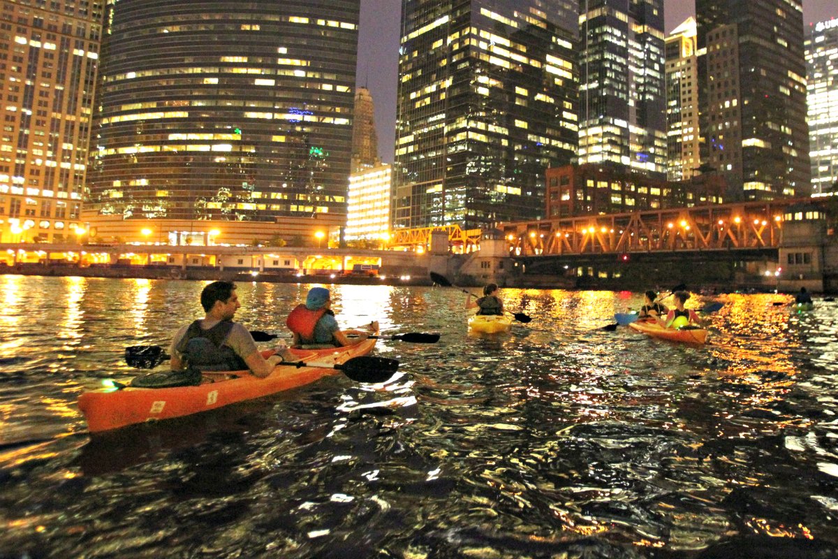 Kayak by night chicago Wateriders feature ROAM Family Travel